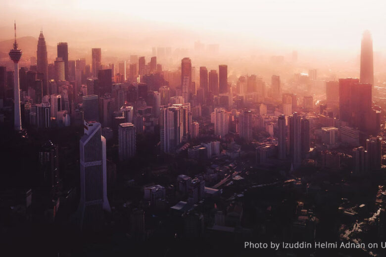 how to be more resilient - Kuala Lumpur city skyline at dawn.